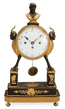 669. An Austrian Empire early 19th Century mantel clock.