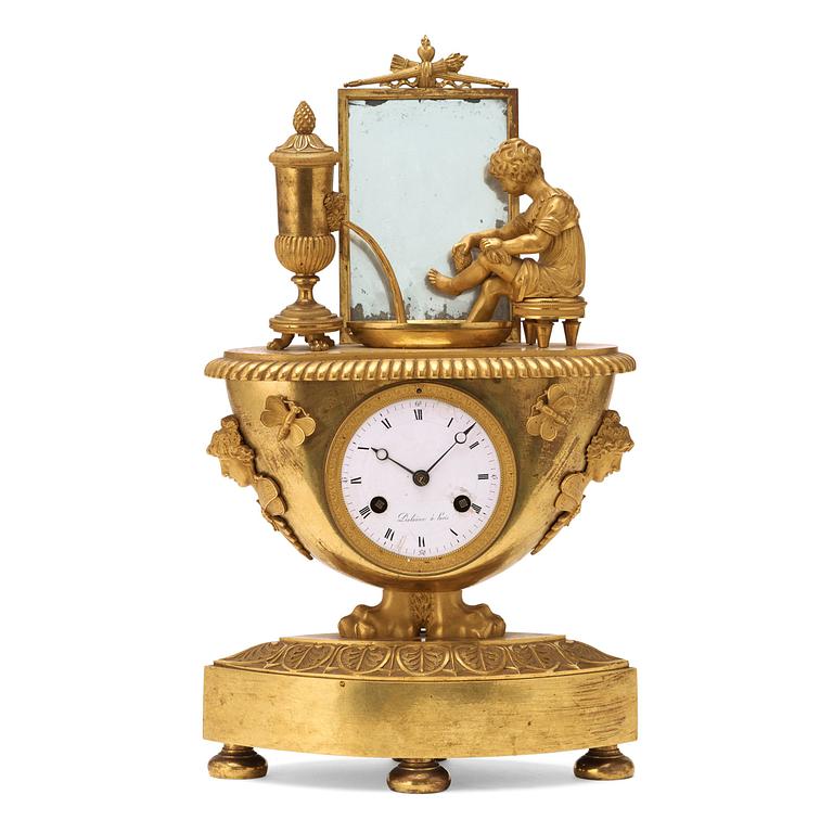 A French Empire early 19th century gilt bronze mantel clock.