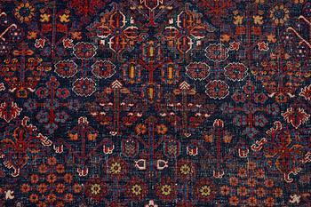 An oriental carpet, c. 360 x 270 cm.