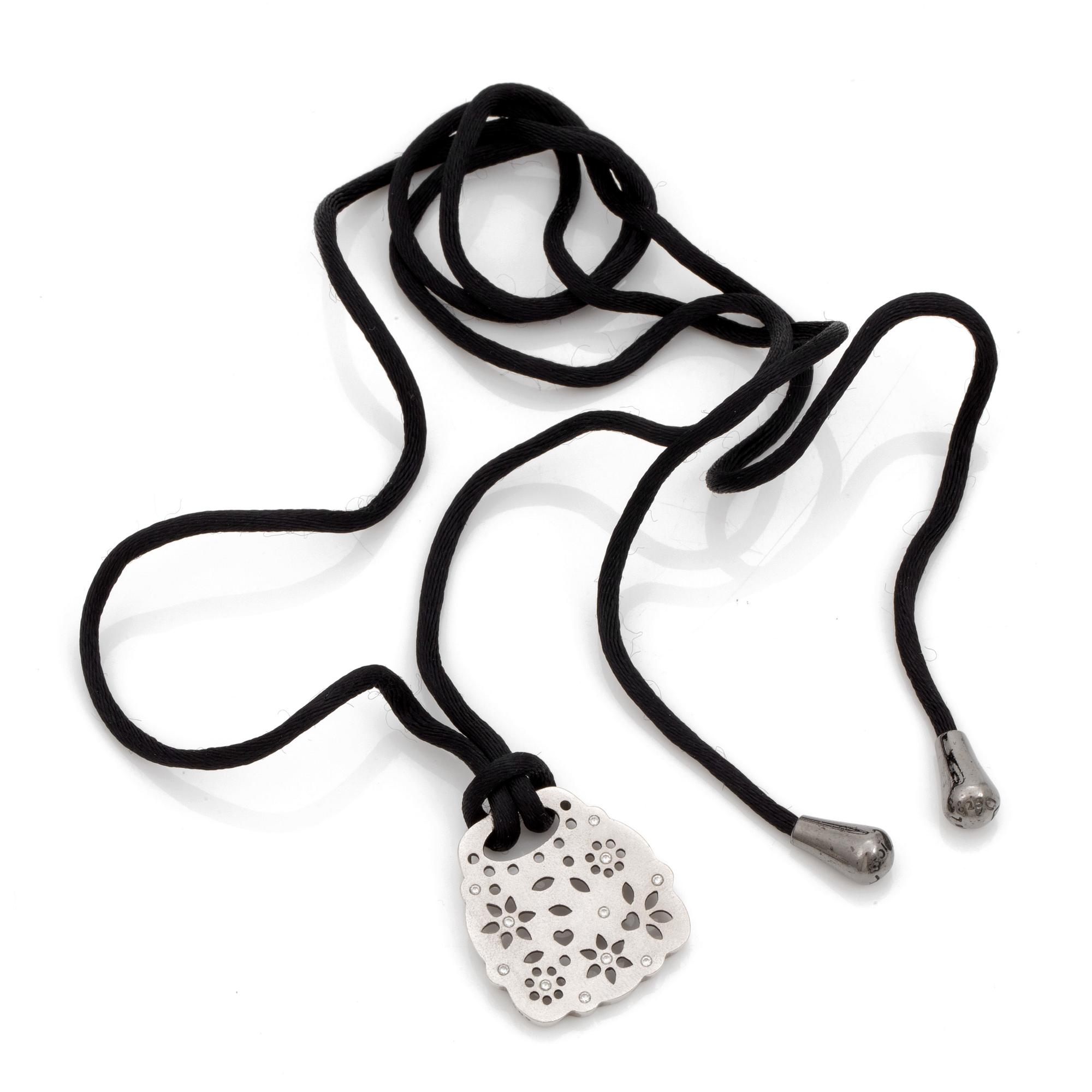 A Charlotte Lyngaard for Ole Lynggaard "Lace" pendant with brilliant cut diamonds total circa 0.11 ct.