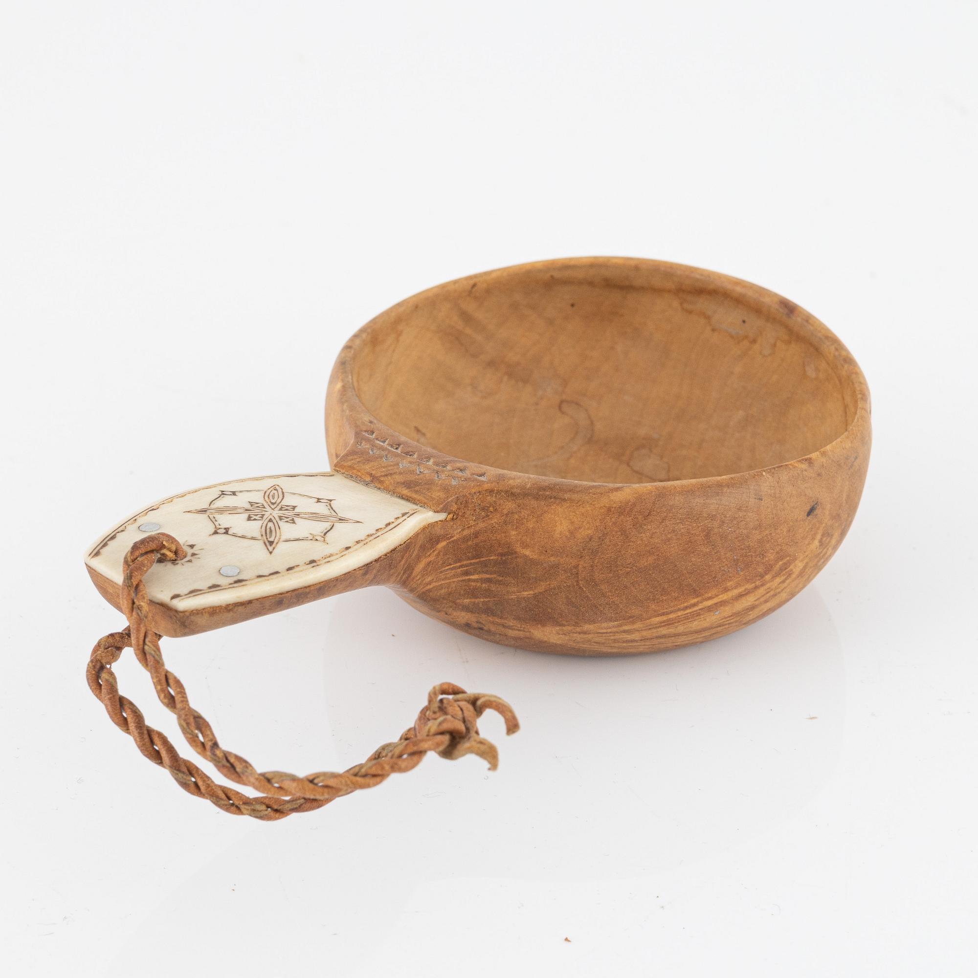 Knife, kuksa, and spoon, signed by, among others, Nikolaus Fankki.