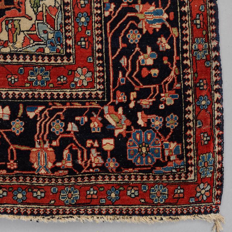 A RUG, a semi-antique Kashan Motachem, ca 217,5 x 134 cm.