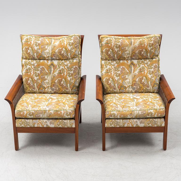 Arne Norell, a pair of 'Rotang' easy chairs, Norell Möbel AB, Sweden.