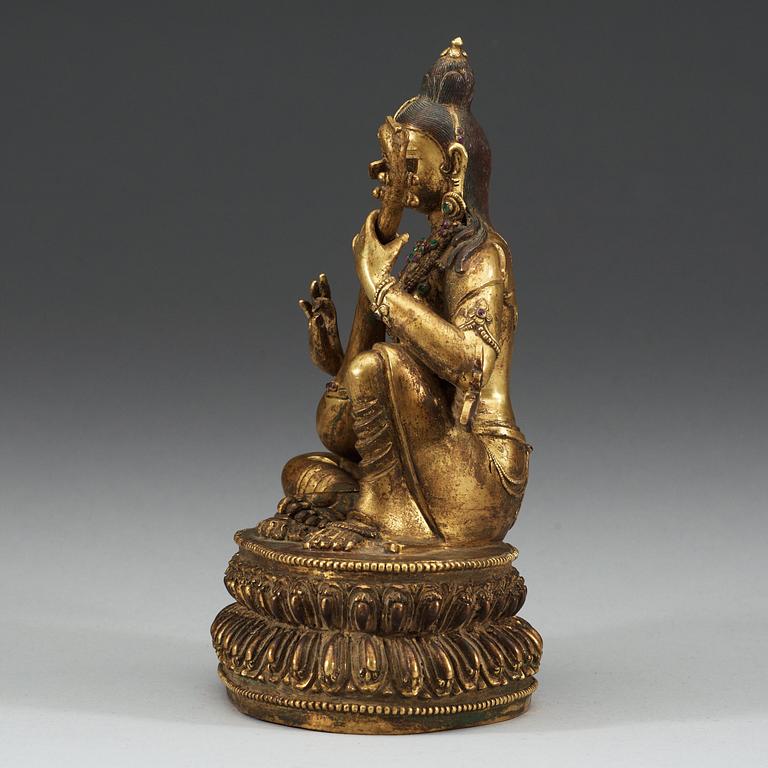 A Sinotibetan jeweled gilt bronze figure of Sarasvati, Qing dynasty, 19th Century.