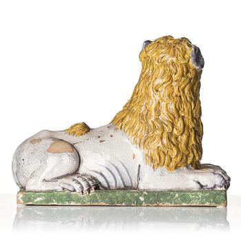 A pair of Luneville recumbent lions, circa 1780-1800.