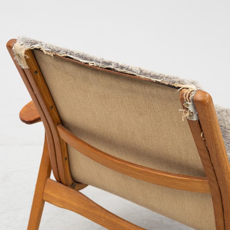 Yngve Ekström, a shearling 'Laminett' easy chair, Swedese.