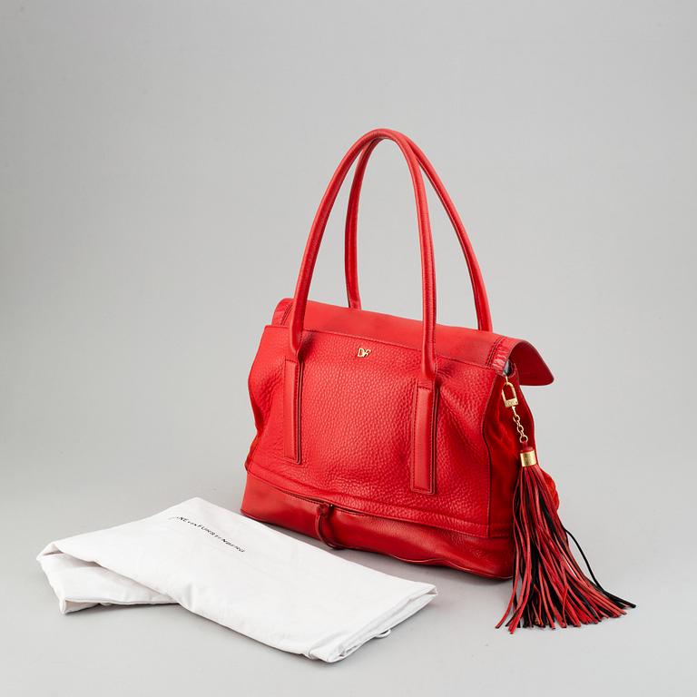 Diane von Fürstenberg a red leather handbag and wallet.