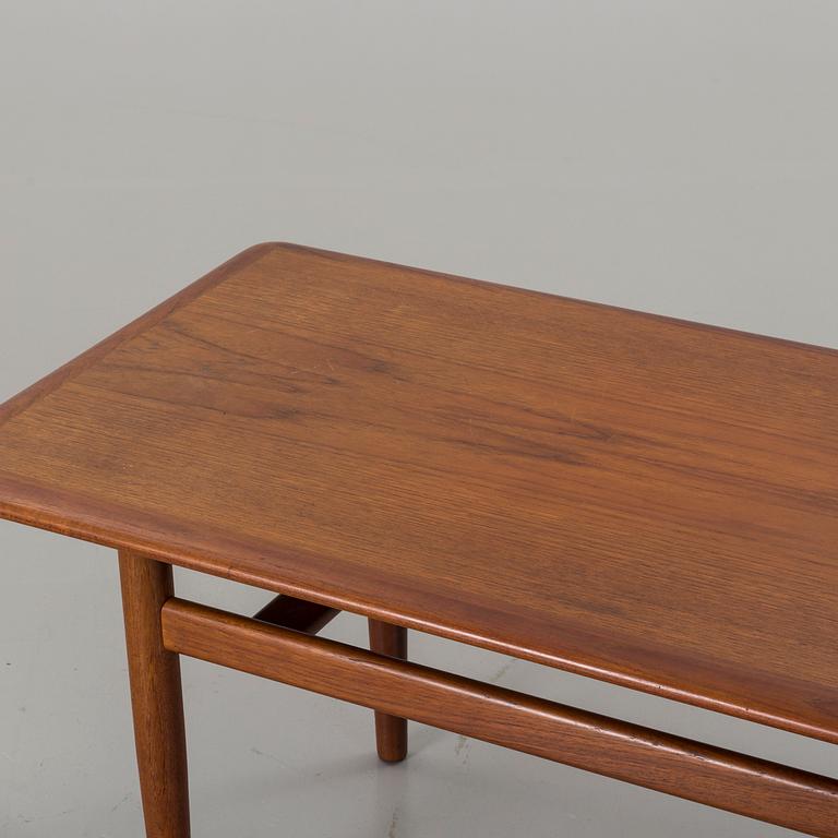 A Danish teak lounghe table.