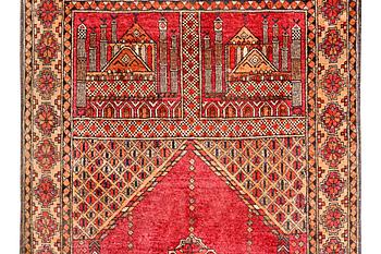 A silk Beluch rug, c. 124 x 81 cm.
