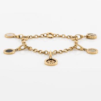 Bulgari, bracelet, with 5 charms (detachable), 18K gold, white gold, onyx, mother-of-pearl, and brilliant-cut diamonds.