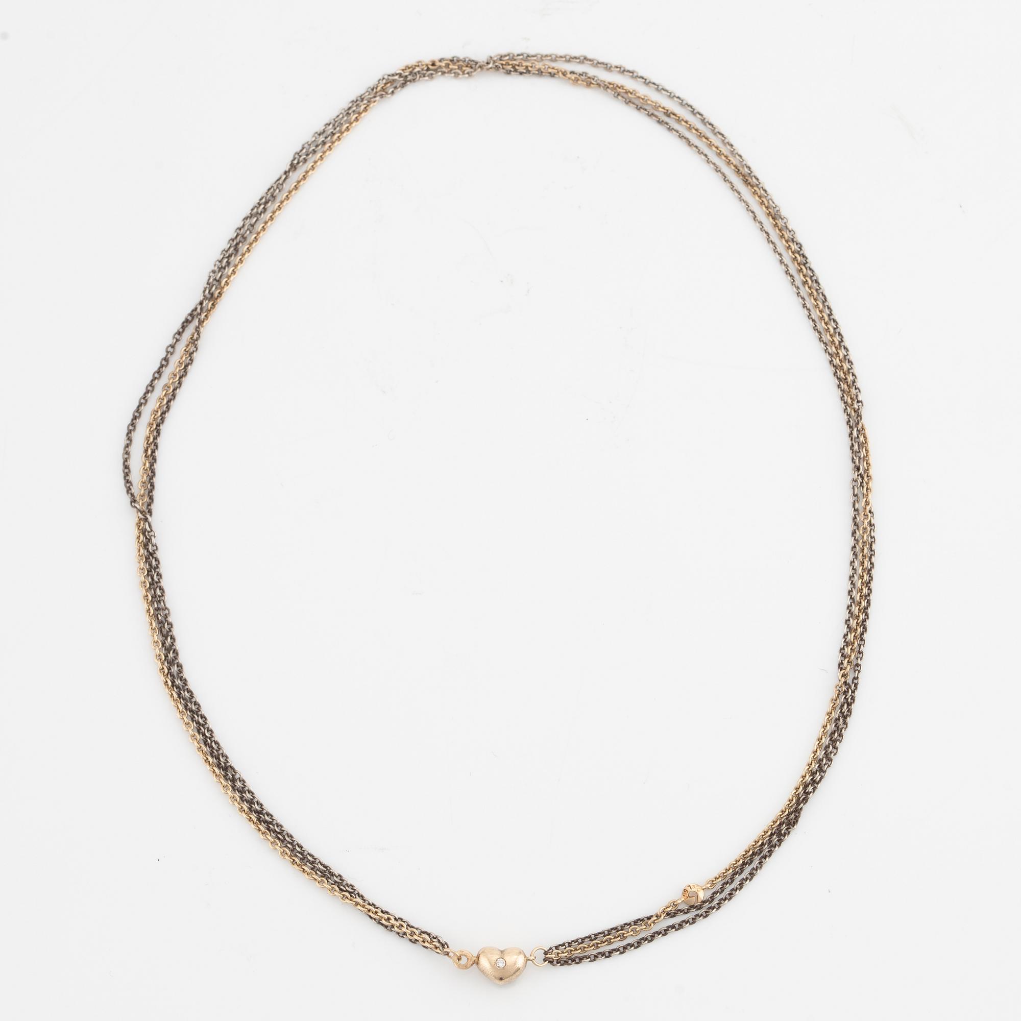 Ole Lynggaard, collier, 14K guld, hjärtformat lås med briljantslipade diamanter.