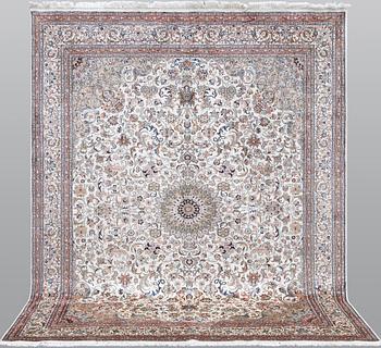 A Kashmir silk carpet, approx. 258 x 201 cm.