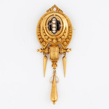 Brooch/pendant, 18K gold with half-pearls and black enamel. Malmö 1872.