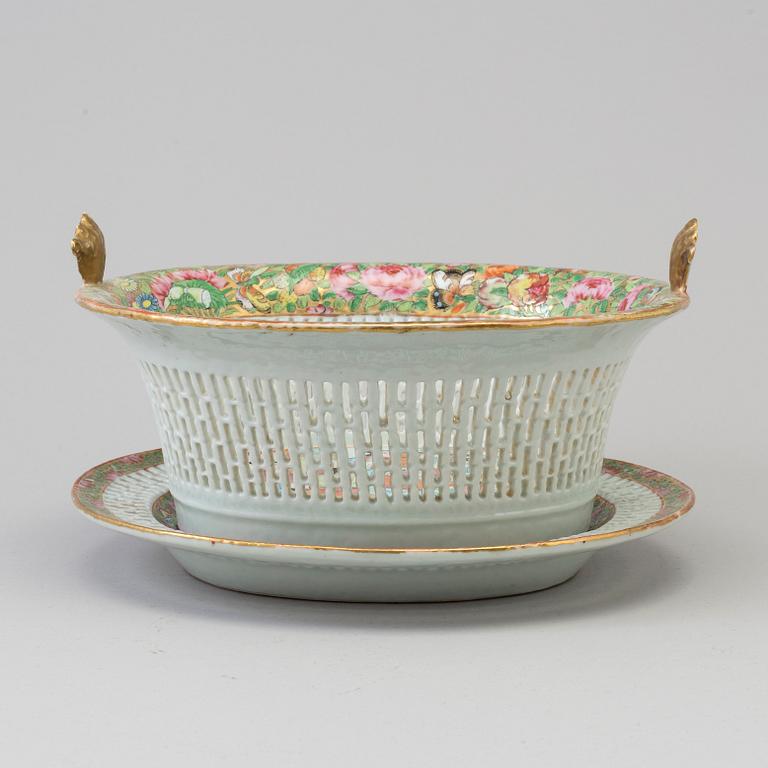 A famille rose porcelain chestnut basket with dish, Canton, Qing dynasty, 19th century.