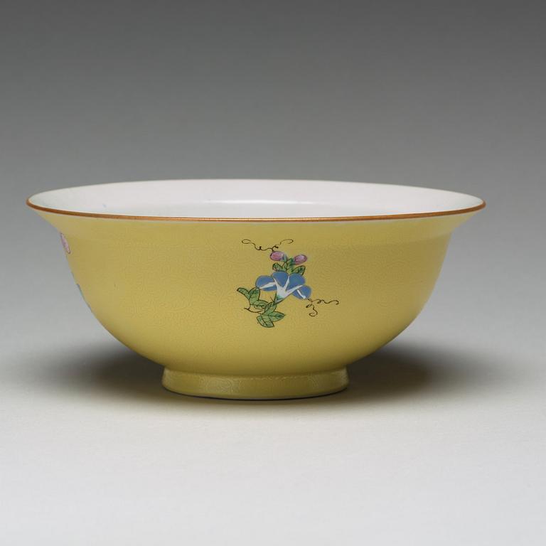 A yellow glazed sgrafitto bowl, late Qing dynasty with Qianlong mark.