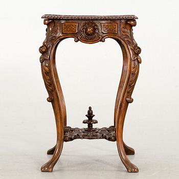 A NEO ROCOCO SMALL TABLE.