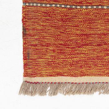 A kilim runner, approximately 297 x 93 cm.