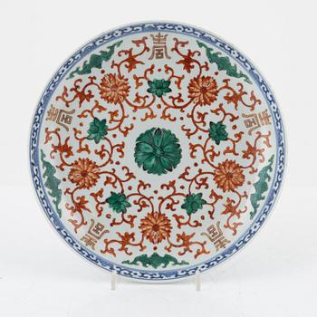 An enamelled and iron red Chinese dish, 20th century.
