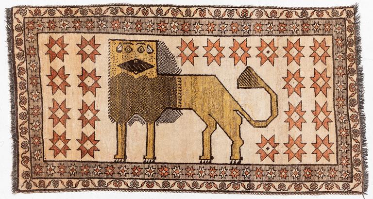 A rug, possibly Shiraz, c. 192 x 104 cm.