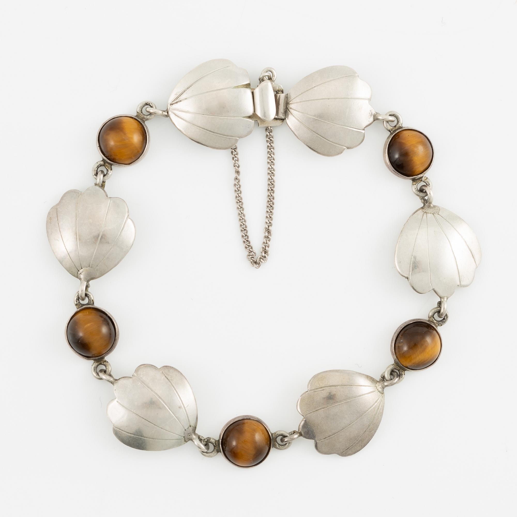Two bracelets, Victor Janson, silver, one set with tiger's eye.
