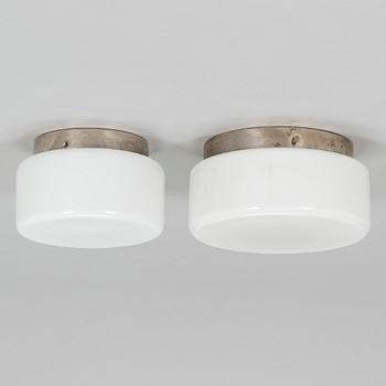 Paavo Tynell, two mid-20th century '2033' ceiling lights for Taito and Idman.