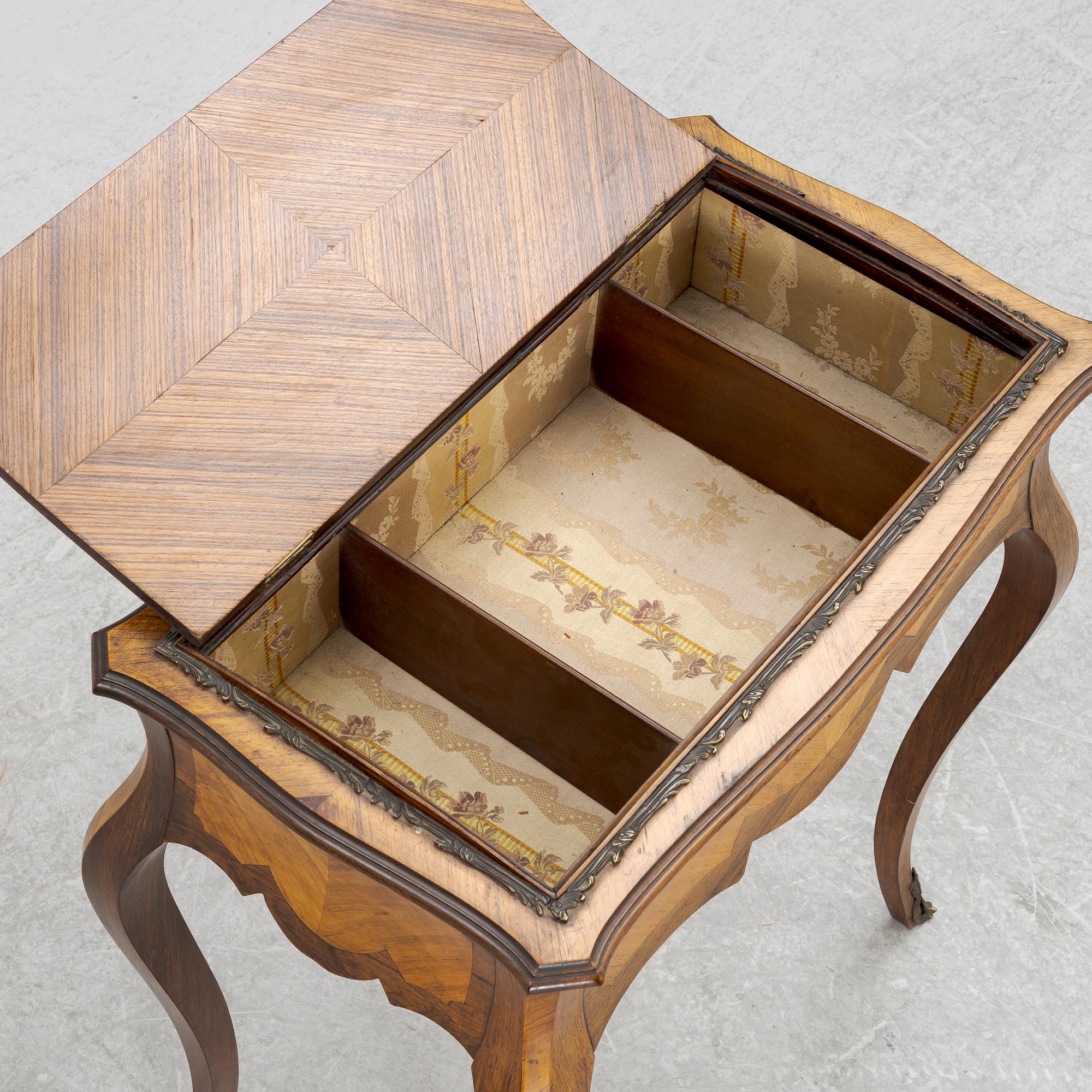 A Louis XV style table, circa 1900.