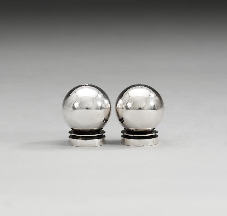 A pair of Harald Nielsen sterling salt and peppers by Georg Jensen & Wendel, Copenhagen 1945-51,