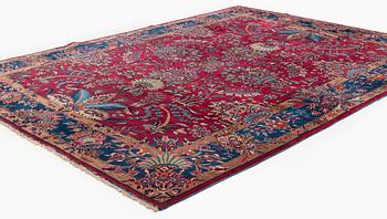 A semi-antique Mashad carpet, northeastern Persia, c. 404 x 307 cm.