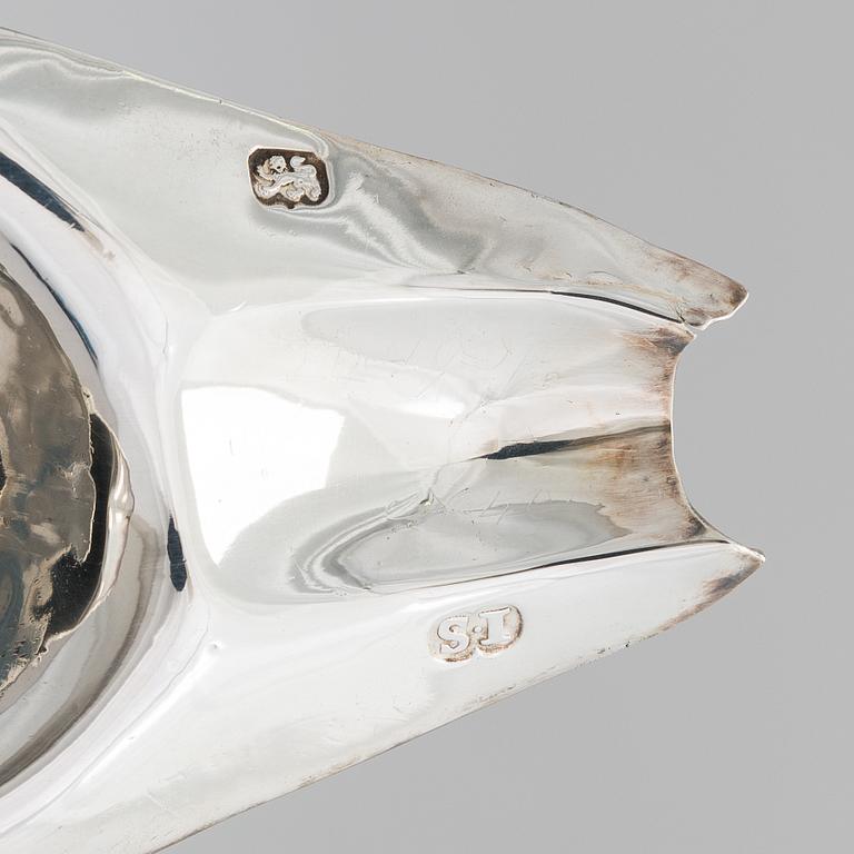 A George III sterling silver ewer by John Scofield, London, 1787.