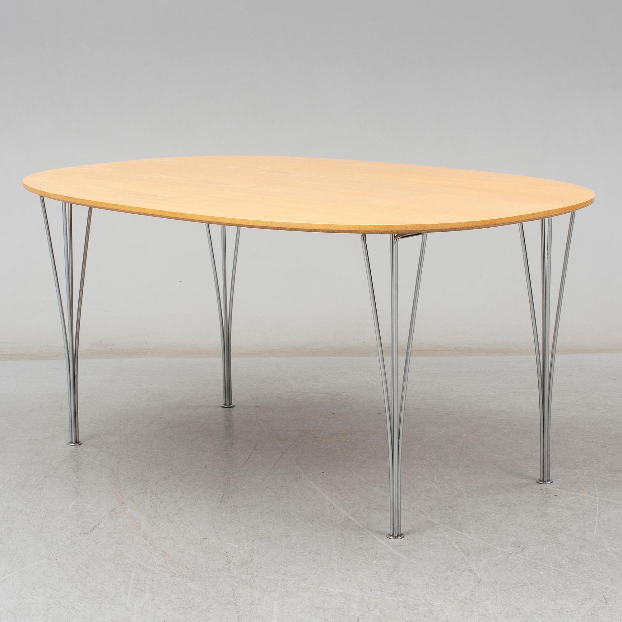 BRUNO MATHSSON & PIET HEIN, a "Superelips" table, Fritz Hansen, 1984.