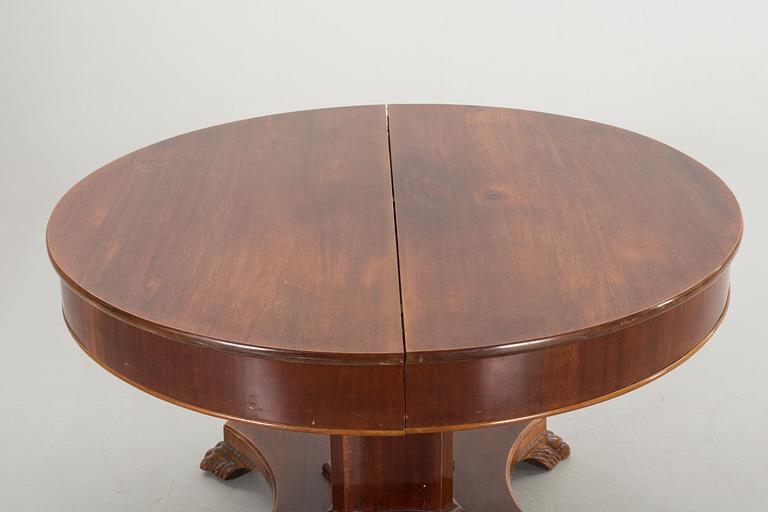 AN EMPIRE STYLE TABLE FROM AROUND 1900.