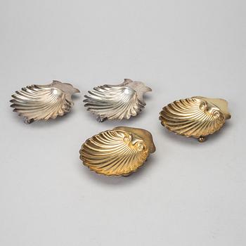 Two pairs of silver butter-shells, mark of Sheffield 1899, Birmingham 1905, & London 1914.