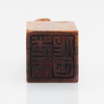 Two pieces of carved agalmatolite, sculpture and seal,one with stamp. China, mid-20th century.
