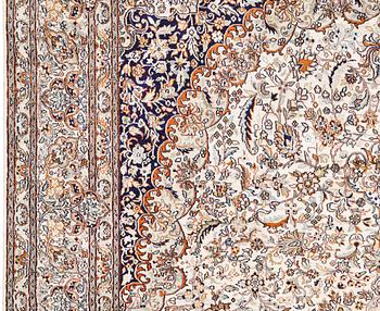 A silk Kashmir carpet, approx. 300 x 200 cm.