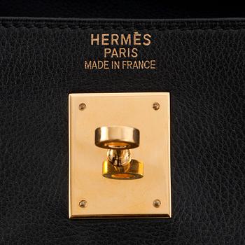 HERMÈS, a black calf leather handbag, "Kelly 35".