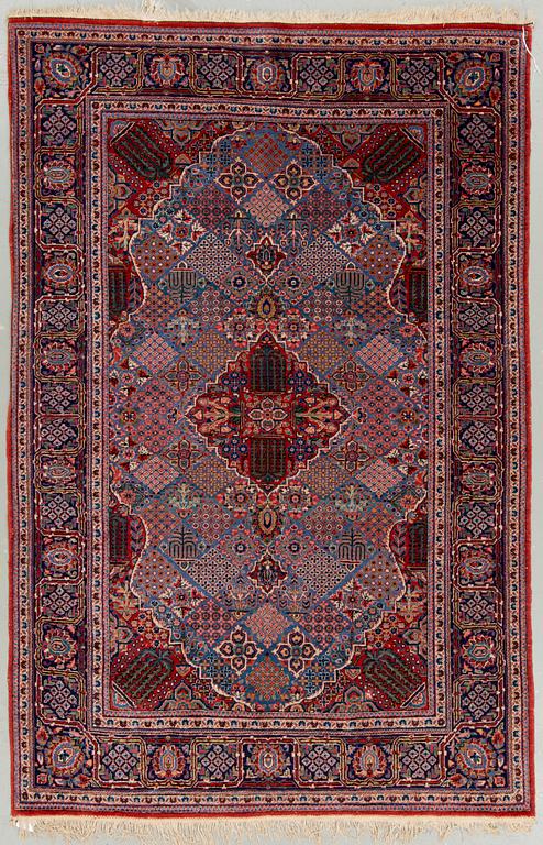 A semi-antique Kashan. Around 203 x 132 cm.