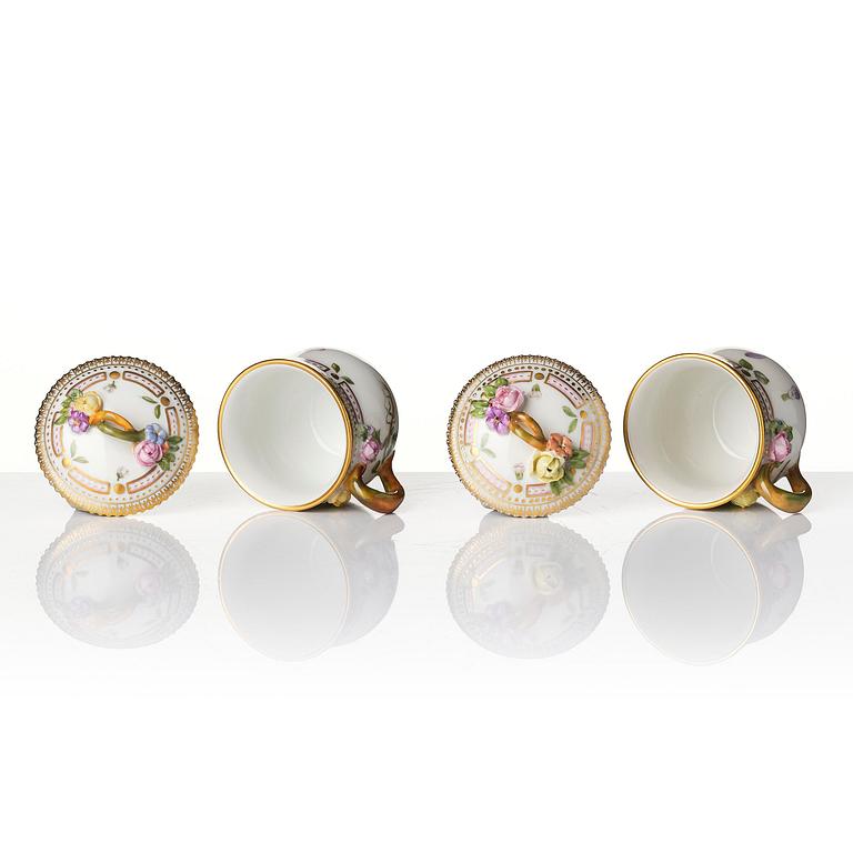 A set with four Royal Copenhagen 'Flora Danica' custard cups with covers and stands, Denmark, 20th century.