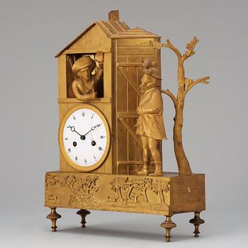 A French "Style troubadour" 19th century gilt bronze mantel clock.