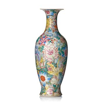 947. A famille rose 'mille fiori' vase, late Qing dynasty, with Qianlong mark.