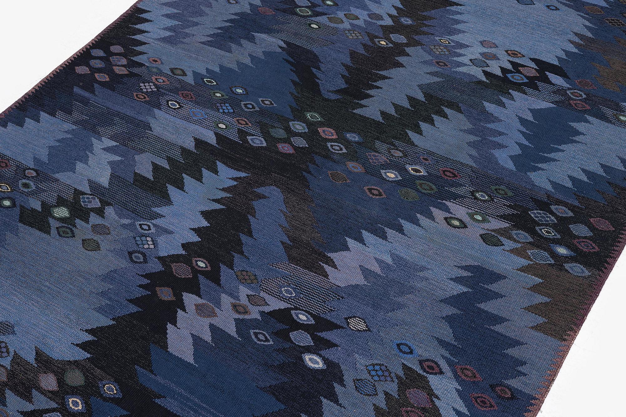 Barbro Nilsson, a carpet, 'Tånga blå', flat weave, c. 300 x 207 cm, signed AB MMF BN.