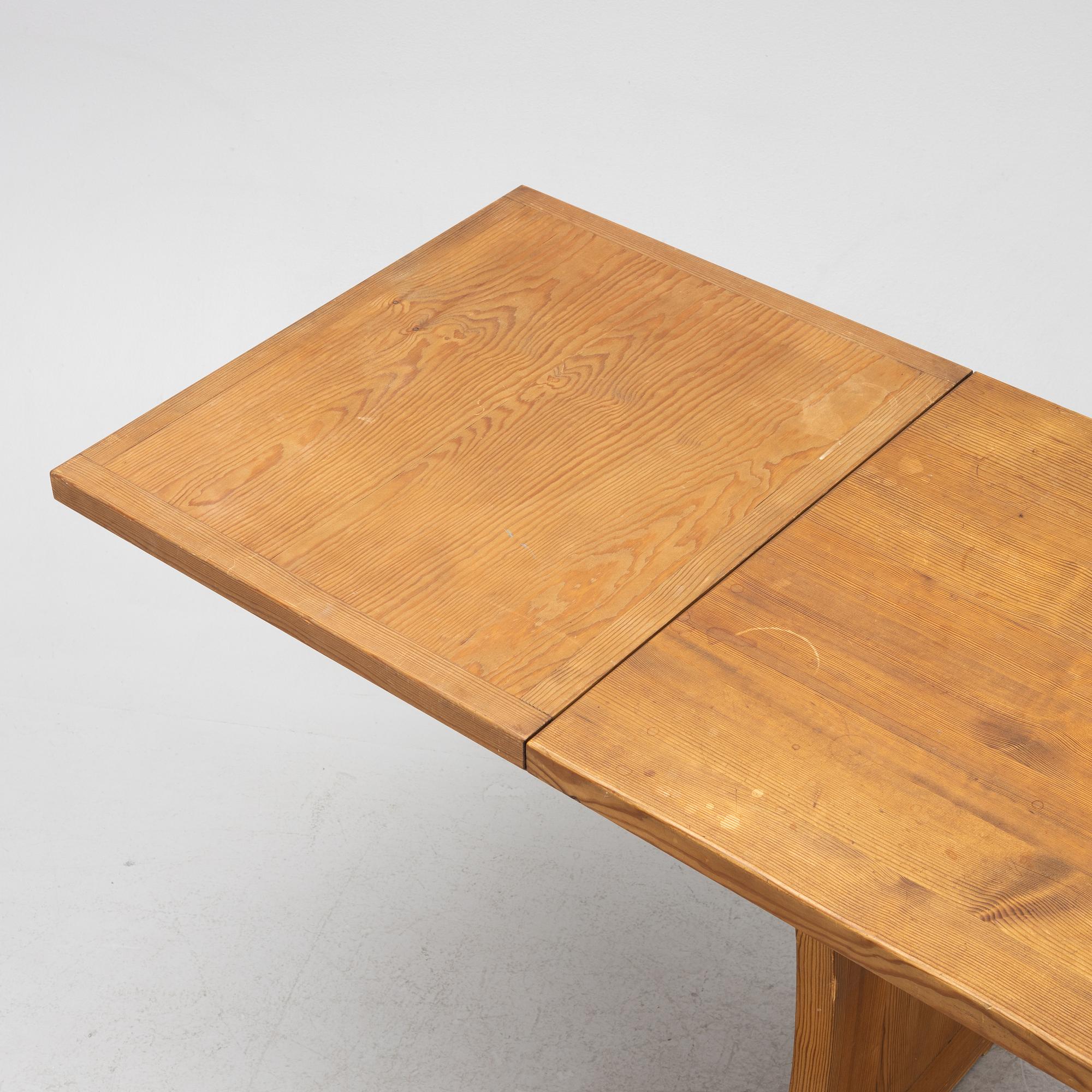 A Nordiska Kompaniet dining table with extension leaves, from the 'Lovö' series.