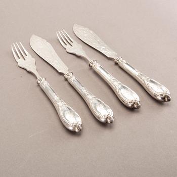 A German 20th century set of 12 fish cutlery low grade silver mark of F W Hespe hamburg early 1900s.