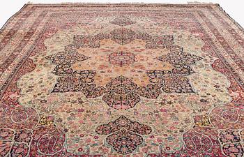 An antique Kerman Laver carpet, c. 586 x 385 cm.