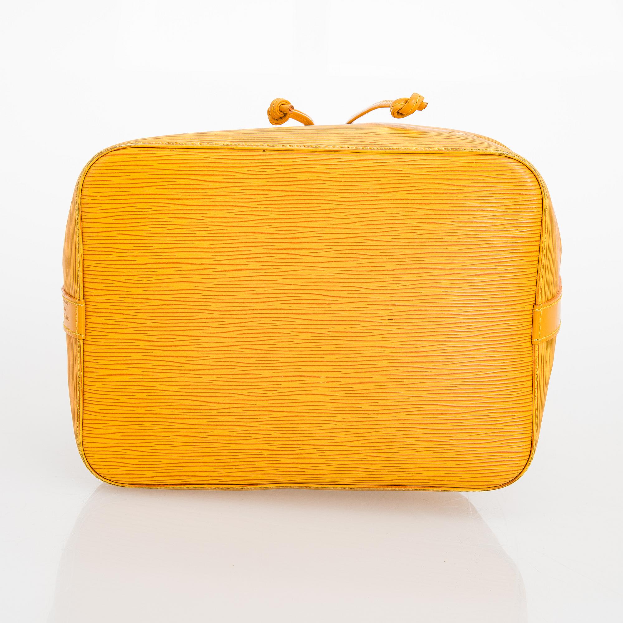 Louis Vuitton, a 'Epi Petit Noé' bag.