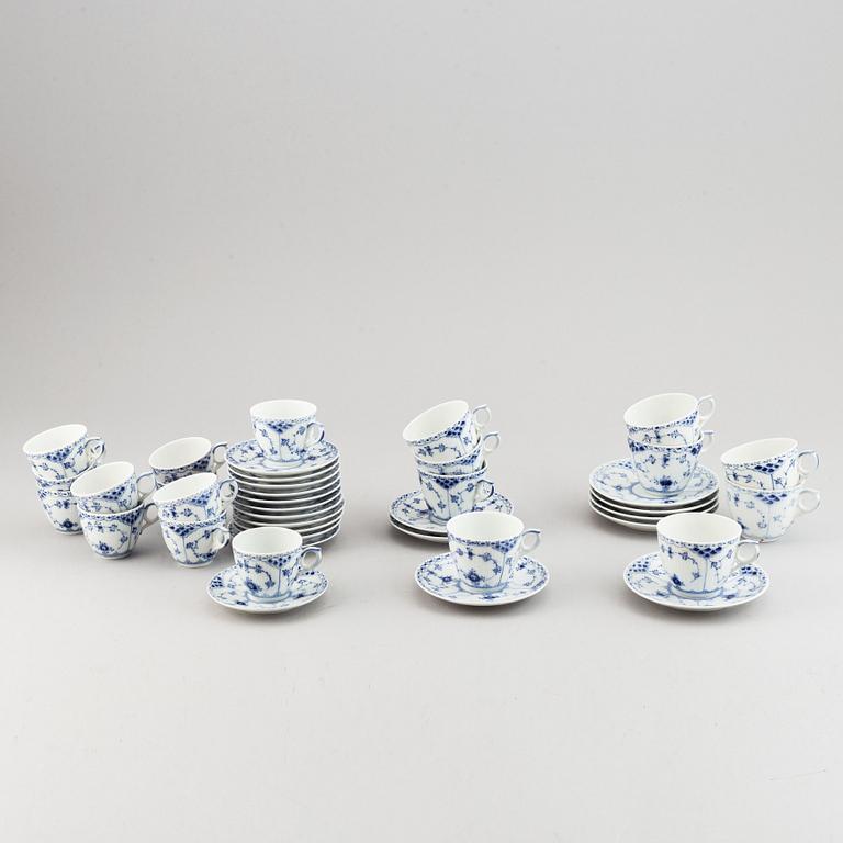 A 92 pcs half lace porcelain dinner-and coffee service, "Musselmalet" from Royal Copenhagen.