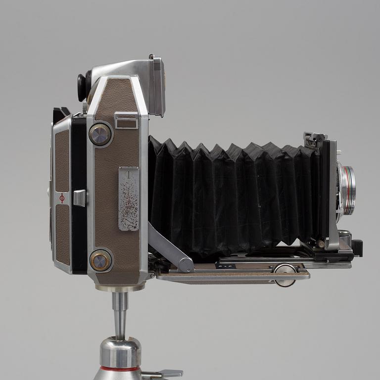 A Linhof Technika camera no 90417 with four lenses and one camera stand from Werst Germany, 1960s.