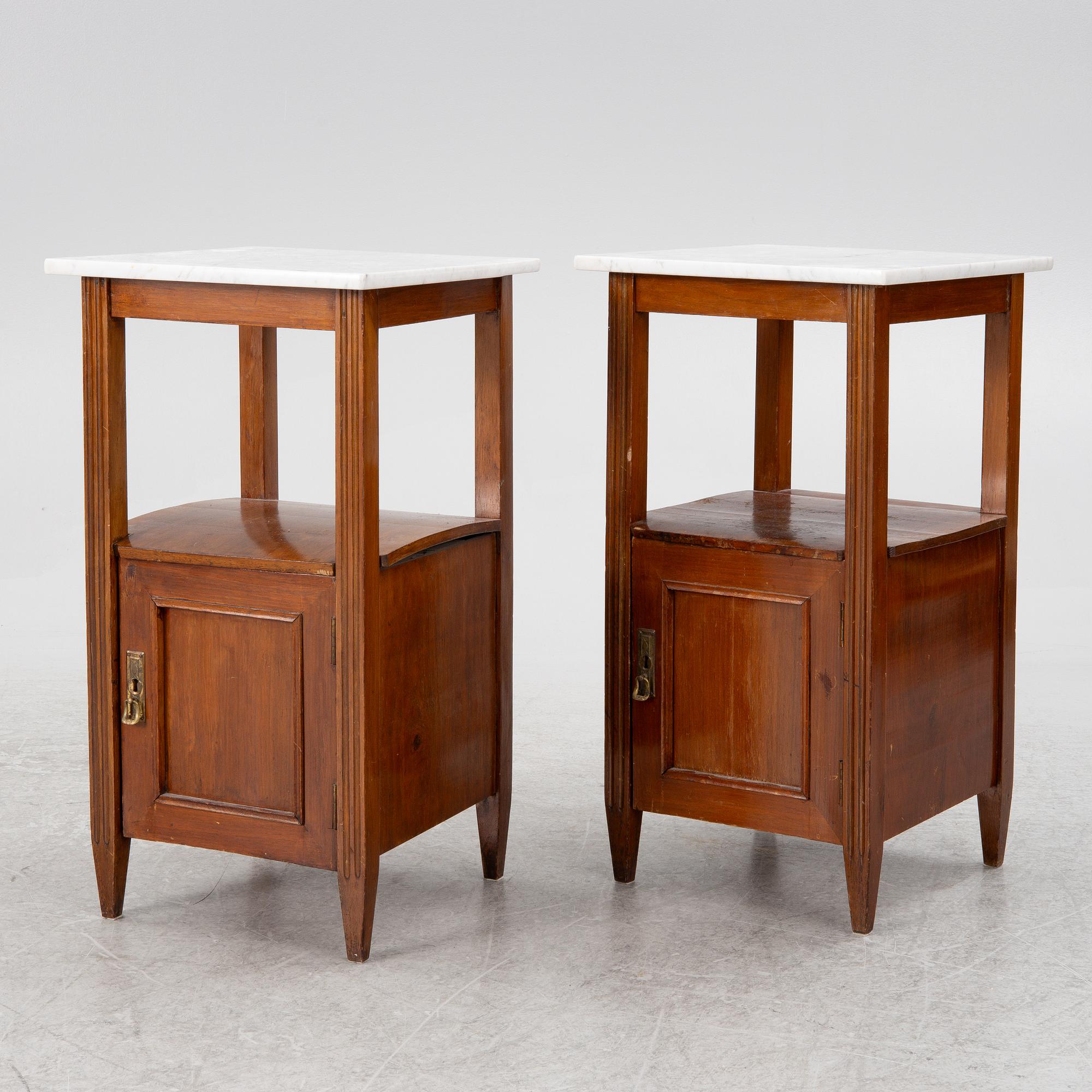 A pair of bedside tables, early 20th century.