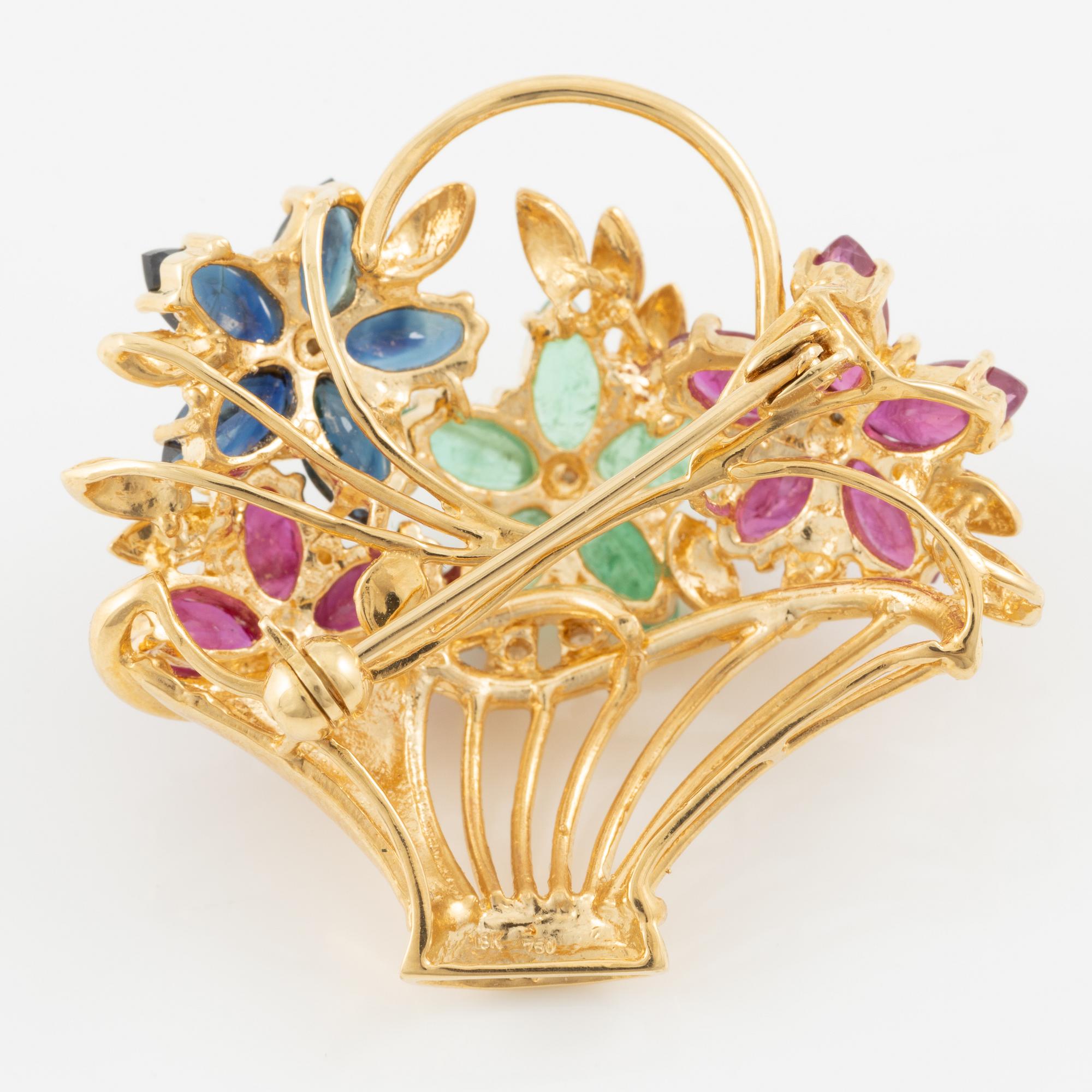 Brooch 18K gold set with round brilliant-cut diamonds as well as emeralds, sapphires, and rubies.