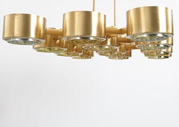 Hans-Agne Jakobsson, A Hans Agne Jakobsson twelve light brass chandelier, model T 363/12, Markaryd, Sweden 1960-70's.