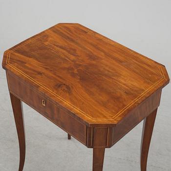 A second half of the 19th century mahogany veneered table.